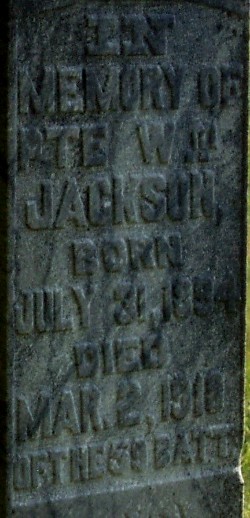 The inscription on the gravestone for Private William Henry Jackson, who is buried in the Pioneer Cemetery in Coe Hill, Ontario. Although Private Jackson fought and was wounded as a soldier of The Royal Canadian Regiment and officially recorded a war casualty of that Regiment, he was buried by his family as a soldier of the unit into which he was recruited, the 59th Canadian Infantry Battalion.