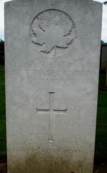 CWGC headstone for an unknown soldier of The Royal Canadian Regiment, buried at Courcelette British Cemetery.