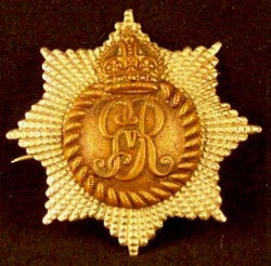 1911 Tudor-crown badge with the Royal Cypher of His Majesty King George V