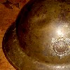 A rare badged First World War Brodie helmet.