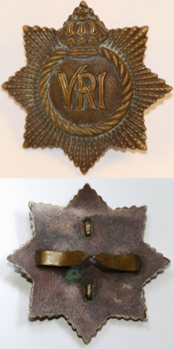 Tanged cast bronze Officer Service Dress cap badge, early 1900s.