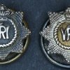 Silver, screw-backed, button hole lapel pins with an 1927 pattern St Edward's Crown decoration, 1/2-inch in diameter. One of the pictured examples has a gilt centrepiece with silver lettering for an officers' variation.