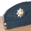 Canadian Forces (unification) wedge cap, rifle green, CF buttons, anodized badge, circa 1970.