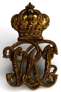 The three styles of Royal Cyphers worn by the Regiment as shoulder strap badges between 1894 and 1915. Photos by Capt M. O'Leary (Private Collection)