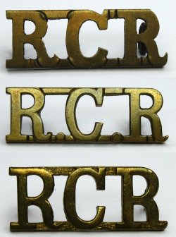 Three examples of brass shoulder titles worn by The RCR. The cut top bar forming the 