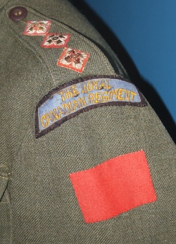 First type embroidered shoulder flash in use during the Second World War.  This example, shown with the 1st Canadian division 