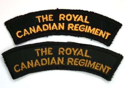 Examples of the 'new' and 'old' gold embroidered flashes worn on the CF greens service dress and work dress (circa 1970 – late 1980s). Photo by Capt M. O'Leary (Private Collection)