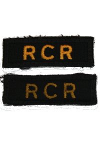 Examples of the 'new' and 'old' gold embroidered titles worn on the CF greens service dress and work dress (circa 1970 – late 1980s). Photo by Capt M. O'Leary (Private Collection)
