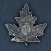 Silver maple leaf brooch with an 1927 pattern St Edward's Crown decoration.