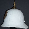 1-piece brass helmet plate on white foreign service helmet, circa 1894